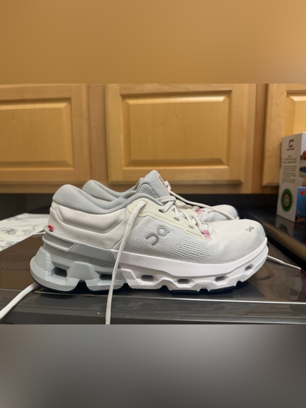 On Running Women's White Running Shoes with Light Pink Accents